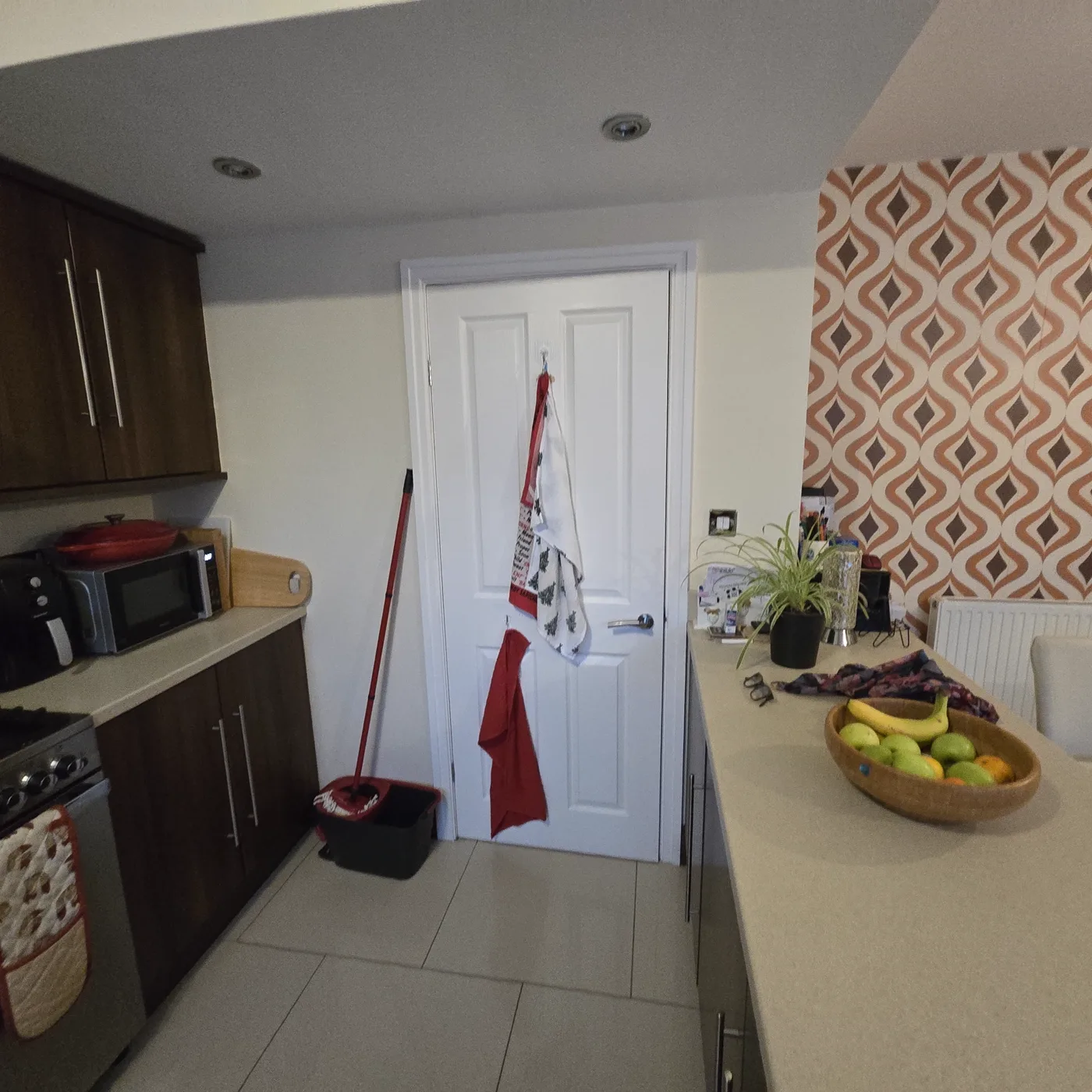 The original open-plan room, with the dining area, television and kitchen together.